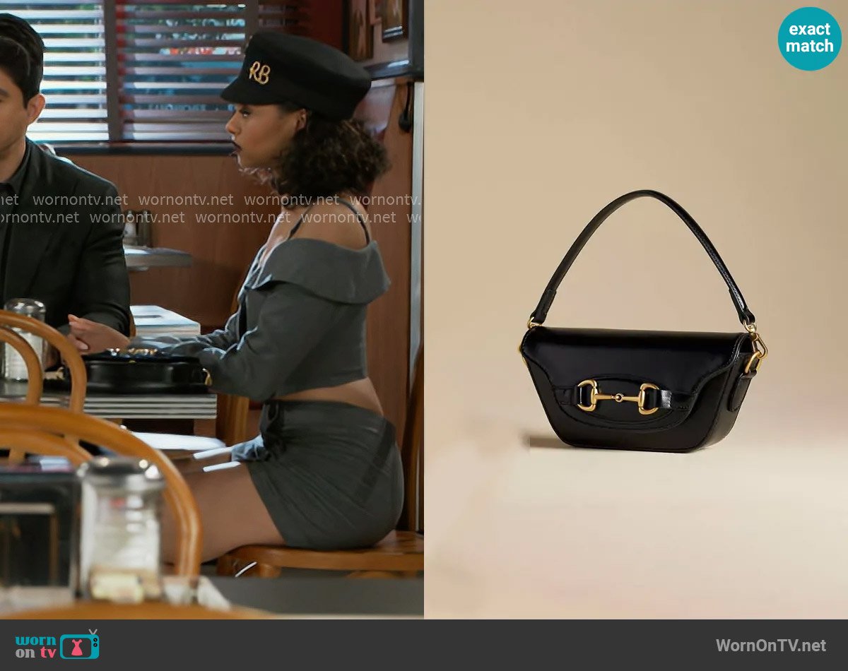 Anthropologie The Delilah Bag Horsebit Edition worn by Kat Richardson (Colby Muhammad) on Beyond the Gates