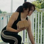 Cherry’s side stripe workout jumpsuit on The Girlfriend
