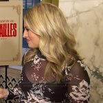 Ashley Bellman’s black floral print mesh dress on E! News