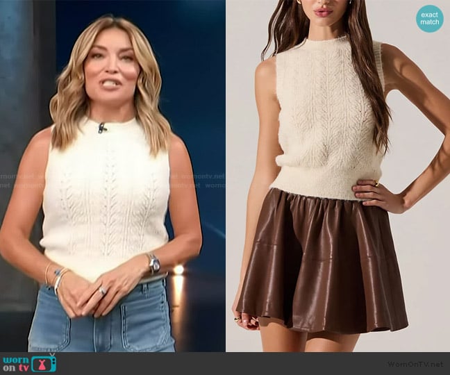 ASTR the Label Pernille Crew Neck Sleeveless Cable Knit Sweater Tank worn by Kit Hoover on Access Hollywood