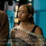 Ava’s open stitch off-shoulder sweater on High Potential