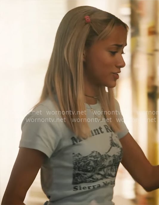 Ava’s Mount Rose graphic tee and green printed jeans on High Potential