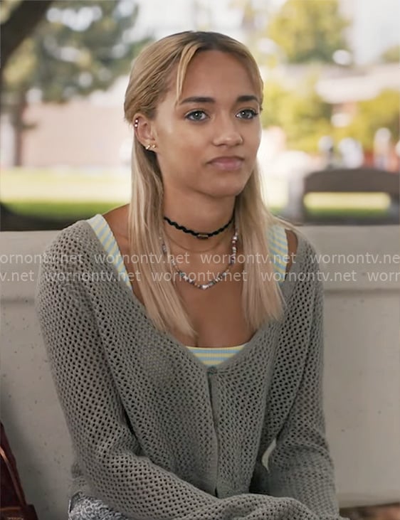 Ava's striped tank top, crochet cardigan and snake print jeans on High Potential
