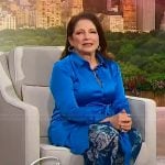 Gloria Estefan’s blue floral print pants on Sherri