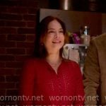 Cassandra’s red pointelle knit cardigan on Murder in a Small Town