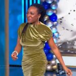 Charity Lockhart’s green velvet ruched dress on Tamron Hall Show