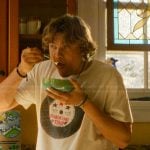 Charlie’s white graphic tee on The Runarounds