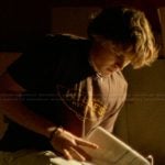 Charlie’s brown graphic tee on The Runarounds