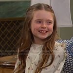 Charlotte’s ivory floral ruffle top on Days of our Lives