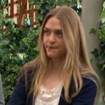 Claire’s white lace top and navy blue cardigan on The Young and the Restless