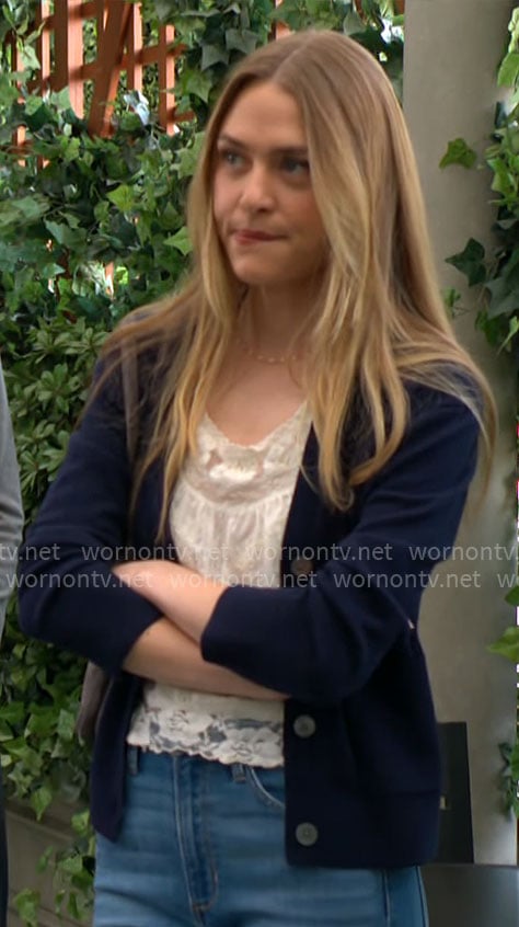 Claire’s white lace top and navy blue cardigan on The Young and the Restless