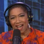 Deja Vu’s red floral print ruffle top on Live with Kelly and Mark