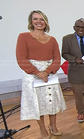 Dylan’s brown v-neck sweater and white print skirt on Today