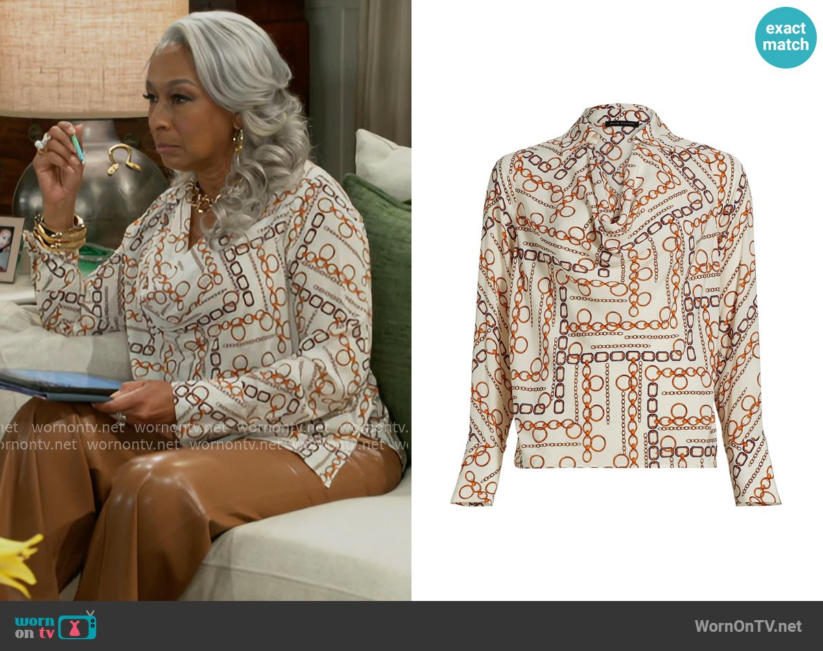 Elie Tahari The Ciaran Gilded Chain Printed Draped Blouse worn by Anita Dupree (Tamara Tunie) on Beyond the Gates