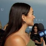 Emily Curl’s green off shoulder dress on E! News