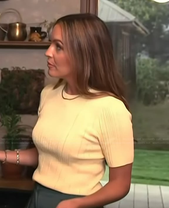 Emily's yellow short sleeve top on Access Hollywood