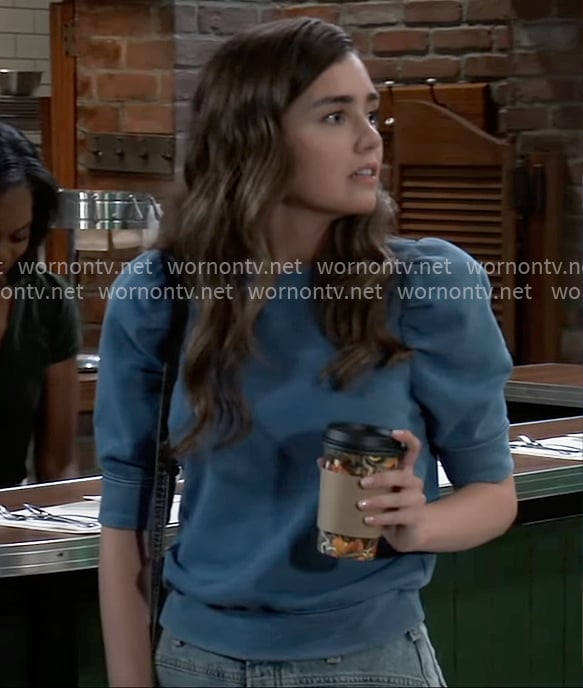 Emma’s blue puff-sleeve sweatshirt on General Hospital