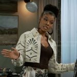 Eva’s cutout cropped jacket and printed skirt on Beyond the Gates
