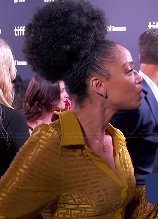 Francesca’s yellow monogram jumpsuit on E! News