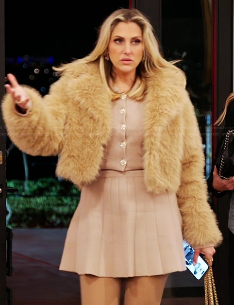 Gina's pink cardigan and mini skirt on The Real Housewives of Orange County