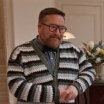 Howard’s stripe knit cardigan on Only Murders in the Building