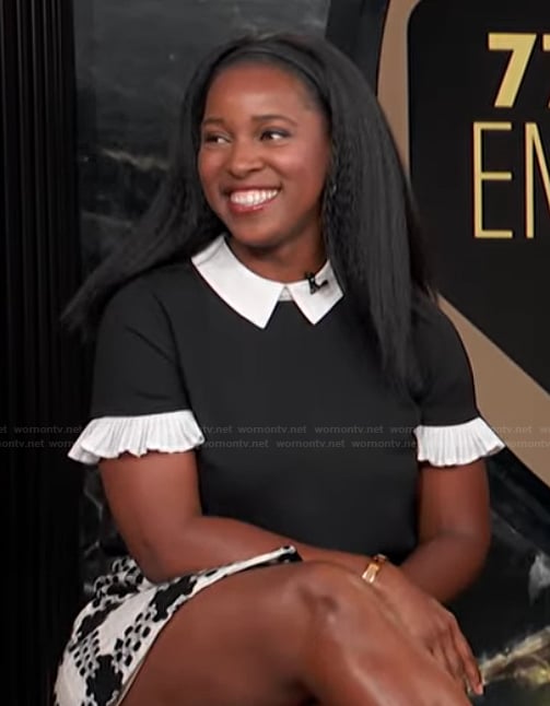 Janine's black contrast top on E! News