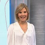 Kate’s white v-neck top and green pants on NBC News Daily