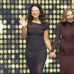 Katie Lowe’s gathered off shoulder mesh dress on Tamron Hall Show