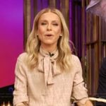 Kelly’s beige tie neck blouse on Live with Kelly and Mark