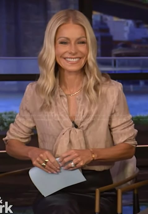 Kelly’s beige tie neck blouse on Live with Kelly and Mark