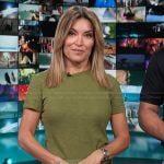 Kit’s green tee and satin skirt on Access Hollywood