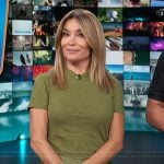 Kit’s green tee and satin skirt on Access Hollywood