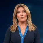 Kit’s navy cable knit polo on Access Hollywood
