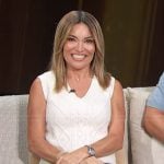 Kit’s white cable-knit vest on Access Hollywood