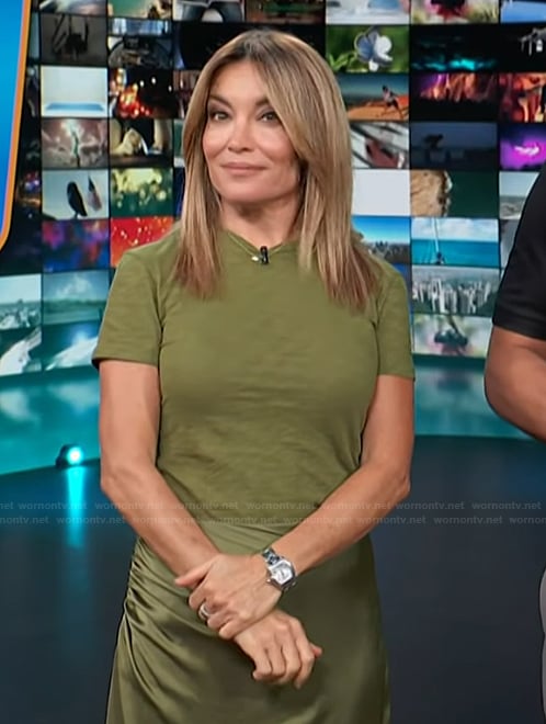 Kit’s green tee and satin skirt on Access Hollywood