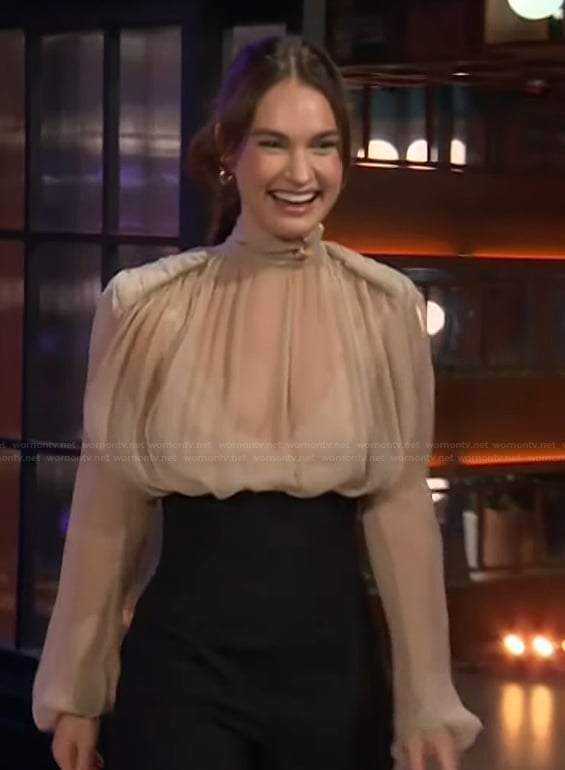 Lily James’s sheer top and high waist pants on The Kelly Clarkson Show