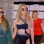 Lisa’s black one shoulder strap swimsuit and skirt on The Real Housewives of Miami