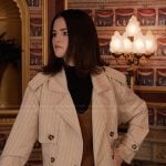 Mabel’s white pinstripe coat on Only Murders in the Building