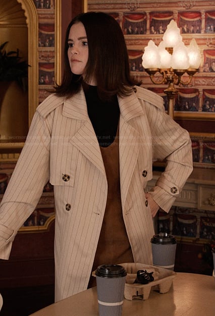 Mabel's white pinstripe coat on Only Murders in the Building