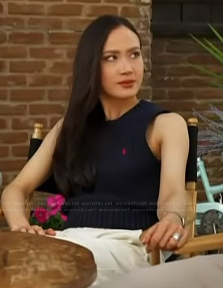 Madison Chock's navy vest on Access Hollywood