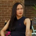 Madison Chock’s navy vest on Access Hollywood