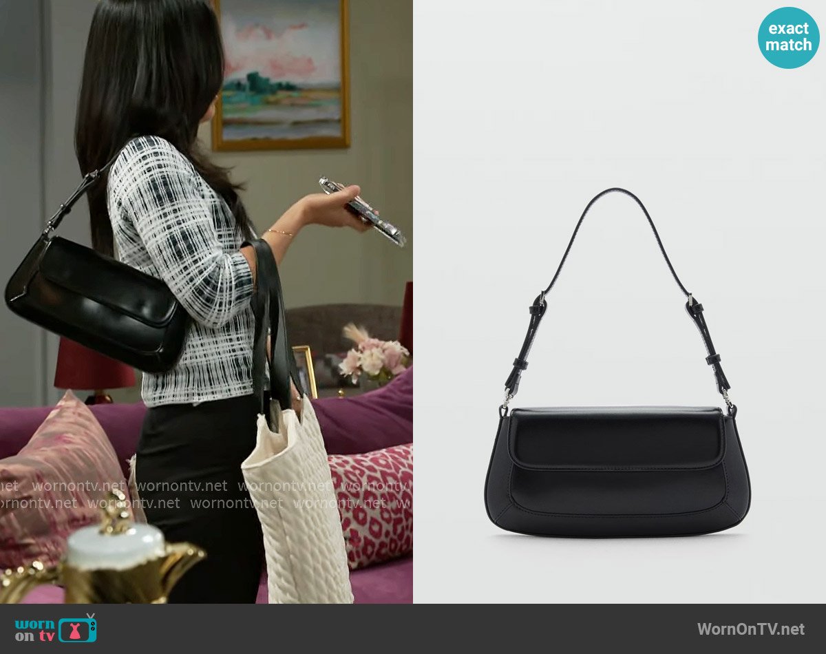 Mango Shoulder bag with strap worn by Caroline Lee (Ellie Wang) on Beyond the Gates
