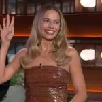 Margot Robbie’s brown metallic tube top and skirt on The Kelly Clarkson Show