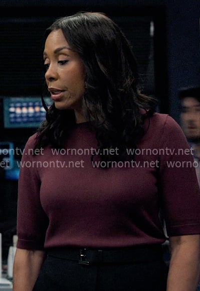 Mia's purple short-sleeve sweater on The Morning Show