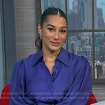 Morgan’s blue blouse and pants on NBC News Daily