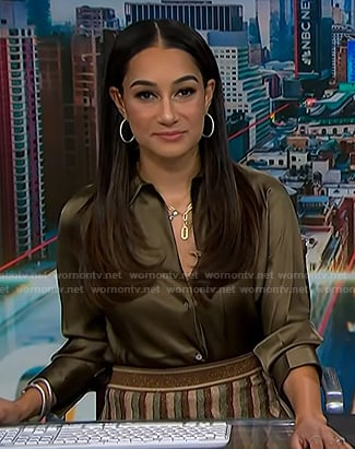 Morgan's green blouse and striped skirt on NBC News Daily