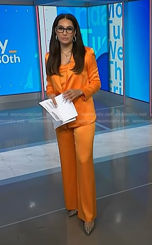 Morgan’s orange satin suit on NBC News Daily