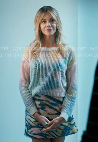Morgan's pastel sweater and tiger print skirt on High Potential