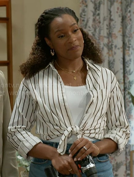 Naomi’s striped shirt on Beyond the Gates