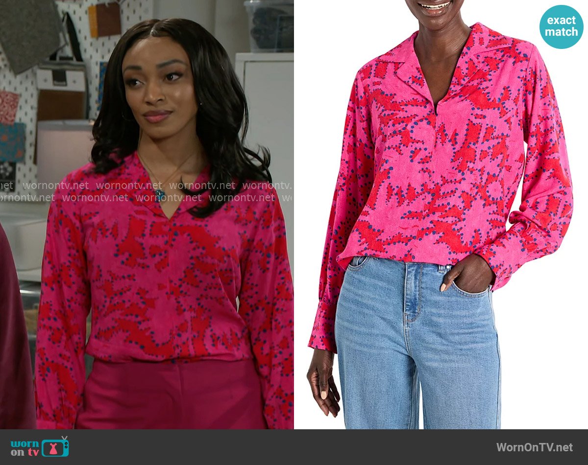 Madison’s pink printed blouse on Beyond the Gates